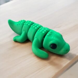 Baby Crocodile Mini, an articulated 3D-printed collectible figure from SpaceCity3D (Minis)