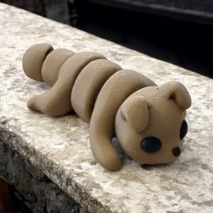 Baby Dog Mini, an articulated 3D-printed collectible figure from SpaceCity3D (Minis)