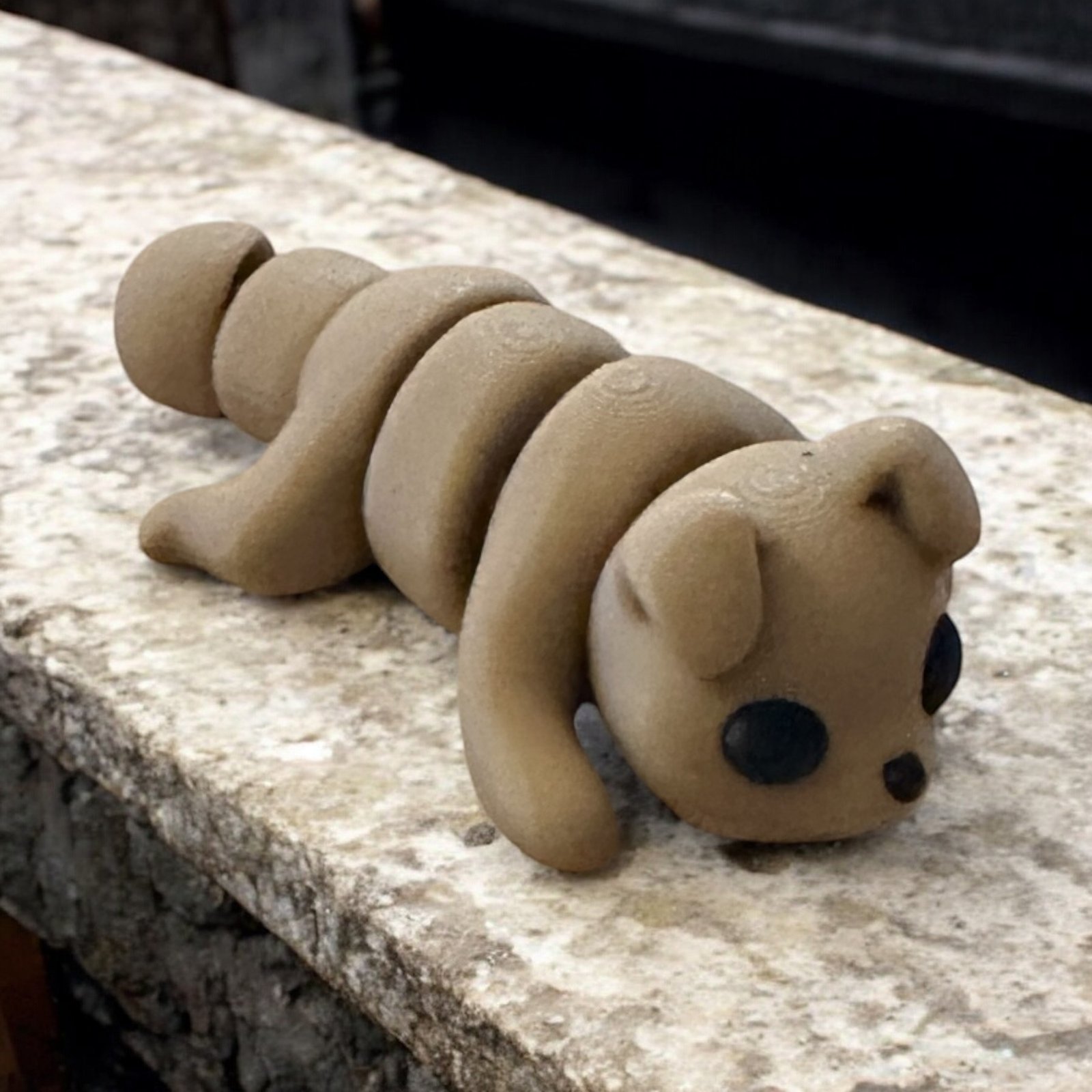 Baby Dog Mini, an articulated 3D-printed collectible figure from SpaceCity3D (Minis)