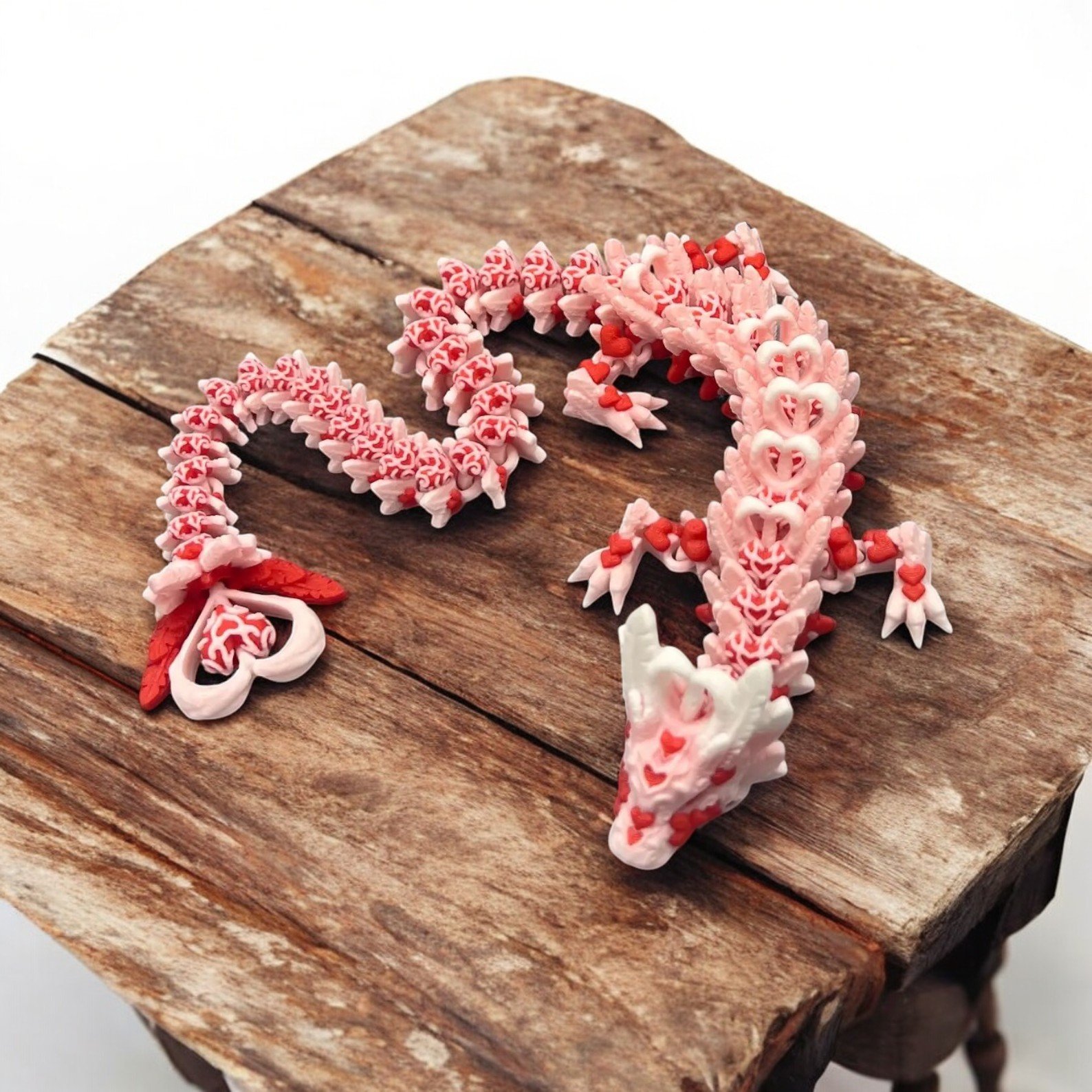 Light Heart Dragon, an articulated 3D-printed collectible figure from SpaceCity3D (Dragons)